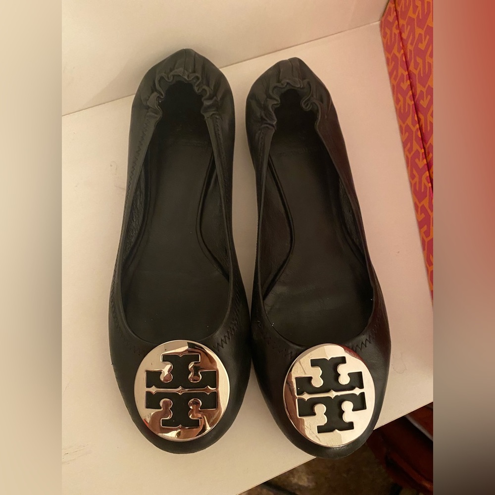 Authentic Tory Burch flats in black with silver emblem. Size 9